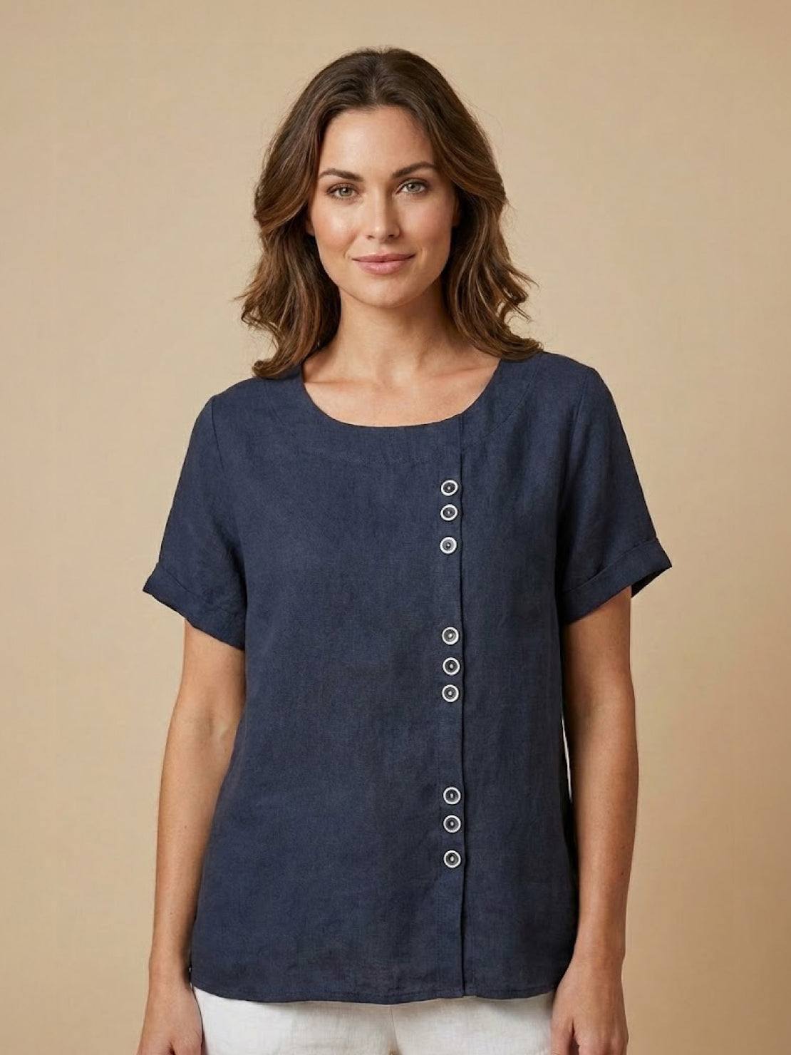 Women’s round neck blouse with button detailing and a relaxed fit, suitable for summer outfits, casual wear, and everyday styling.