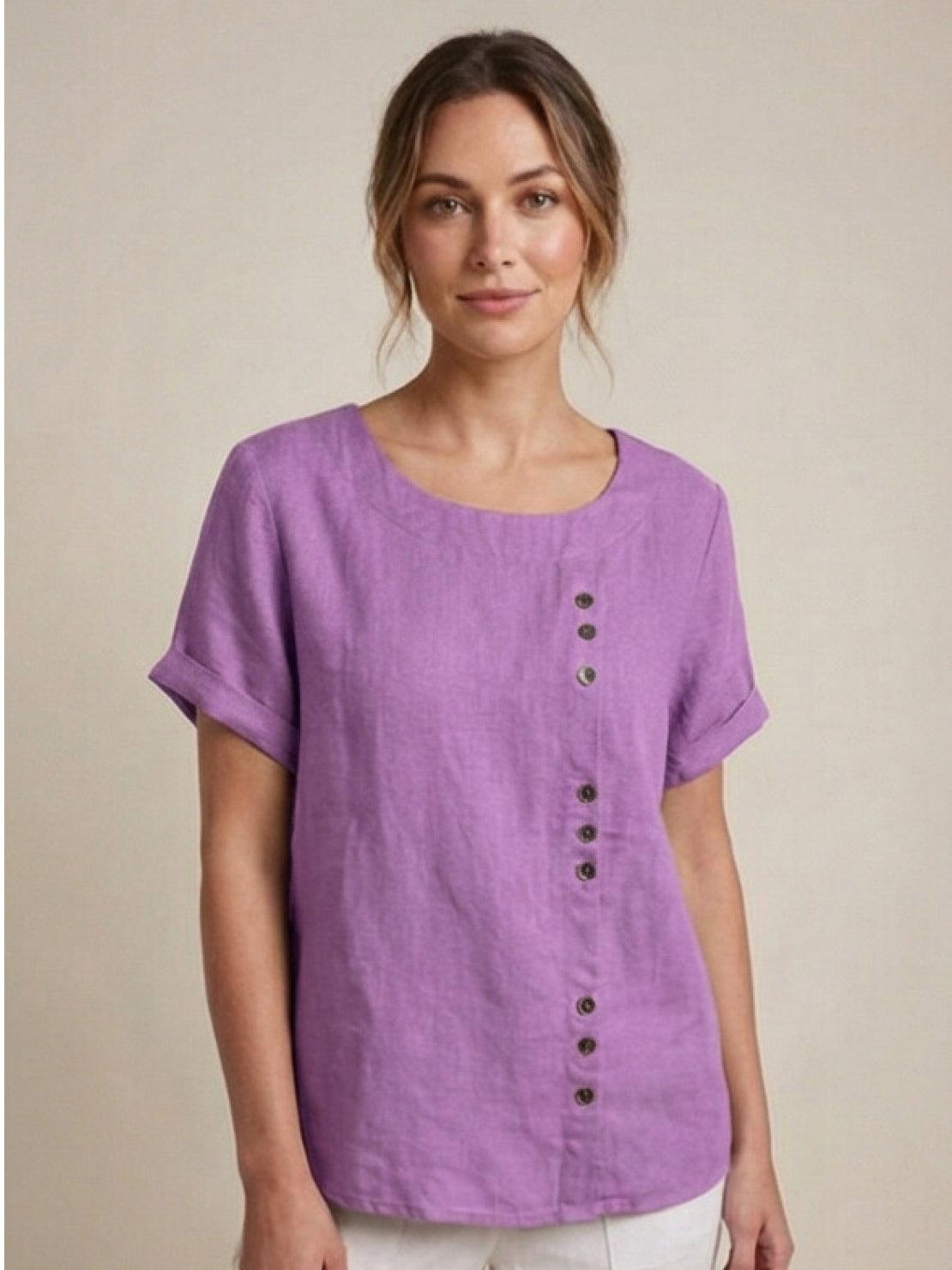 Women’s round neck blouse with button detailing and a relaxed fit, suitable for summer outfits, casual wear, and everyday styling.