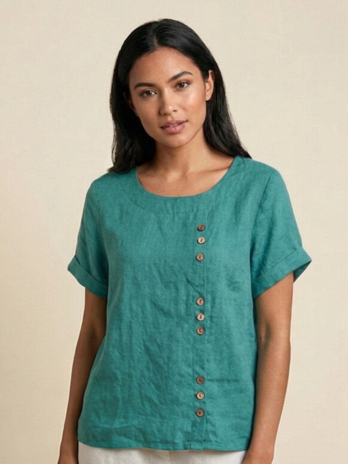 Women’s round neck blouse with button detailing and a relaxed fit, suitable for summer outfits, casual wear, and everyday styling.