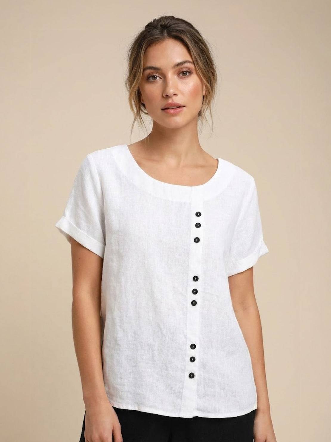 Women’s round neck blouse with button detailing and a relaxed fit, suitable for summer outfits, casual wear, and everyday styling.