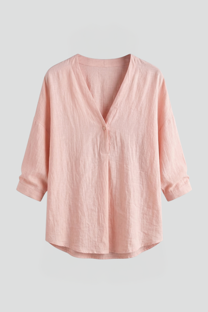 Women’s blouse with round neckline, front button closure, and long sleeves, ideal for office wear and casual everyday outfits.