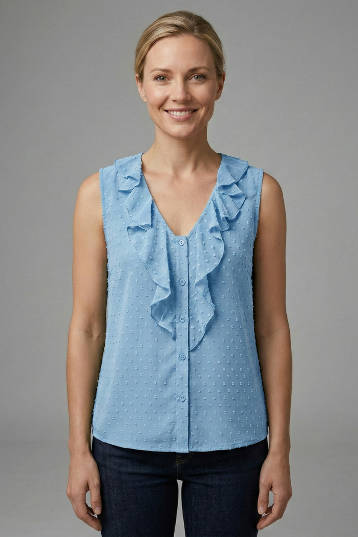 Women’s sleeveless blouse with V-neckline, ruffle trim, button detail, and textured surface, suitable for office wear and casual outfits.