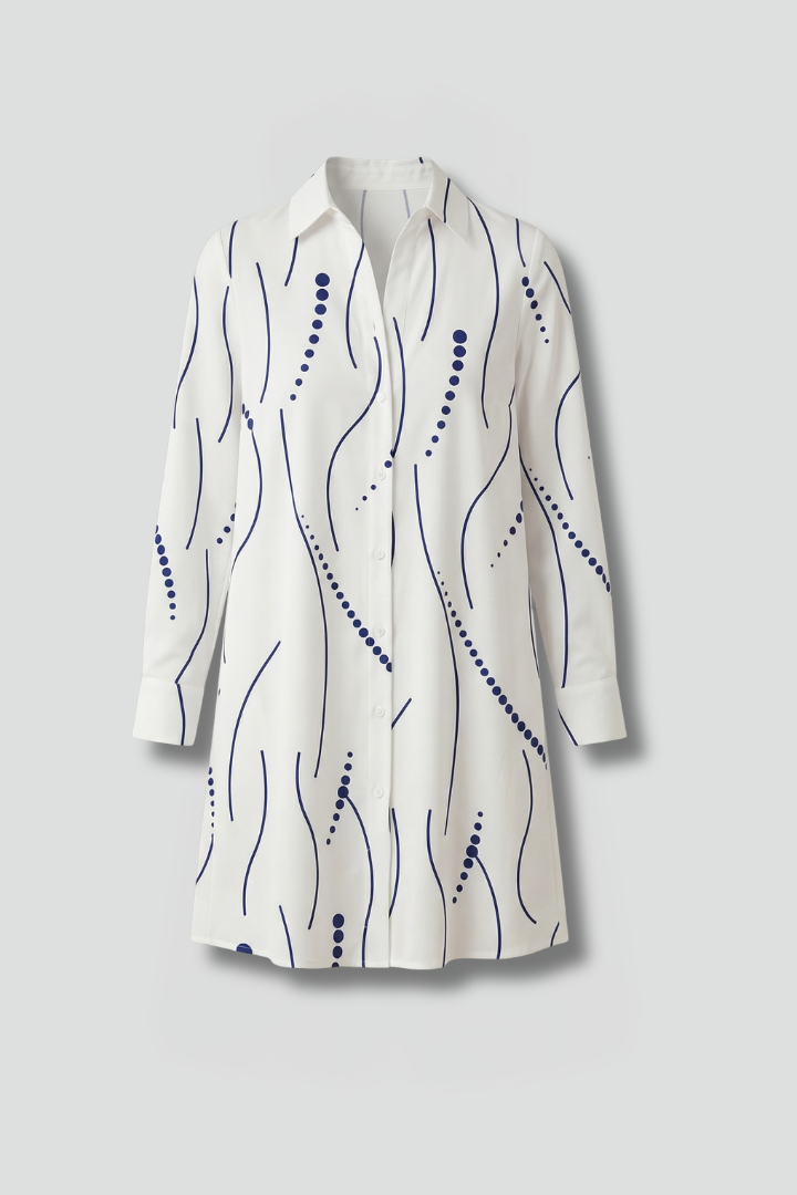 Women’s shirt dress with lapel collar, button-front closure, long sleeves, and wavy patterned surface for casual everyday styling.