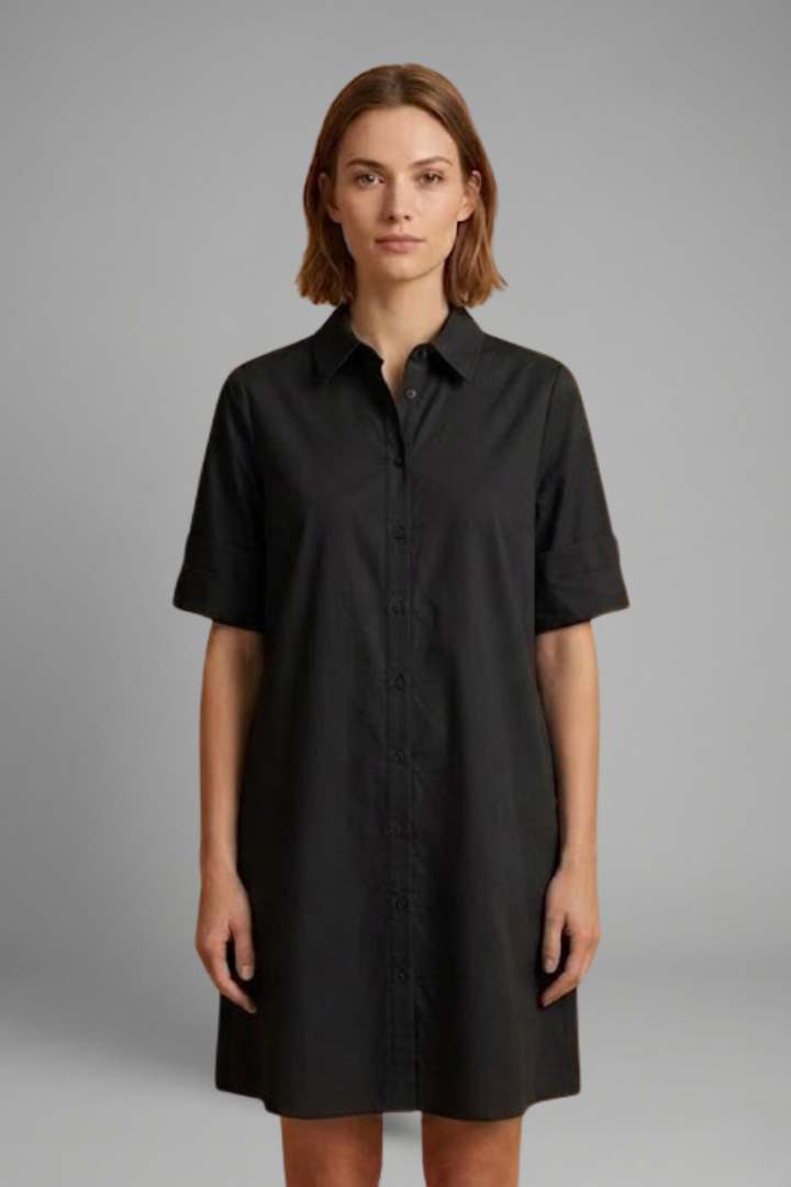Women’s shirt dress with collared neckline, button-down closure, 3/4 sleeves, and A-line silhouette for everyday styling.