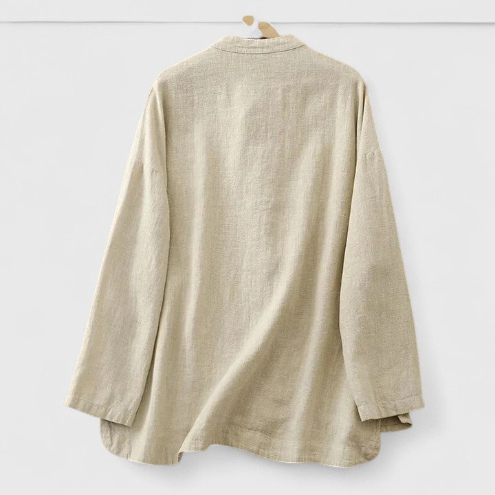 Women’s shirt with knot closures, patch pockets, and a relaxed fit, ideal for casual outings, warm-weather wear, and everyday styling.