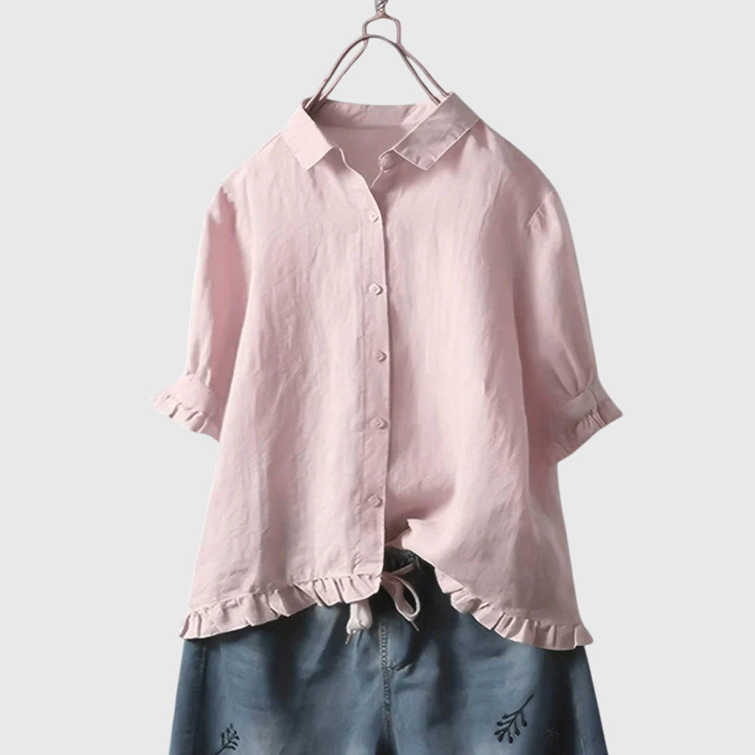 Women’s shirt with a tailored fit and classic design, ideal for office wear, casual outings, and smart-casual occasions.
