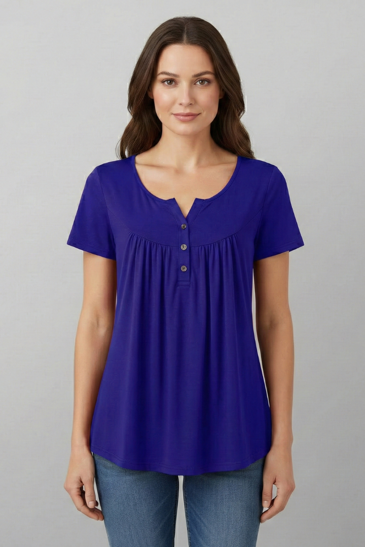 Women’s short sleeve blouse with V-neckline and front button detail, featuring a flared hem and clean finish for everyday wear and office styling.