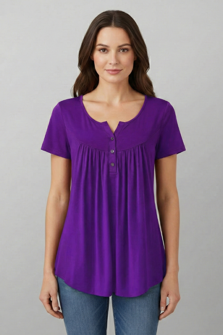 Women’s short sleeve blouse with V-neckline and front button detail, featuring a flared hem and clean finish for everyday wear and office styling.