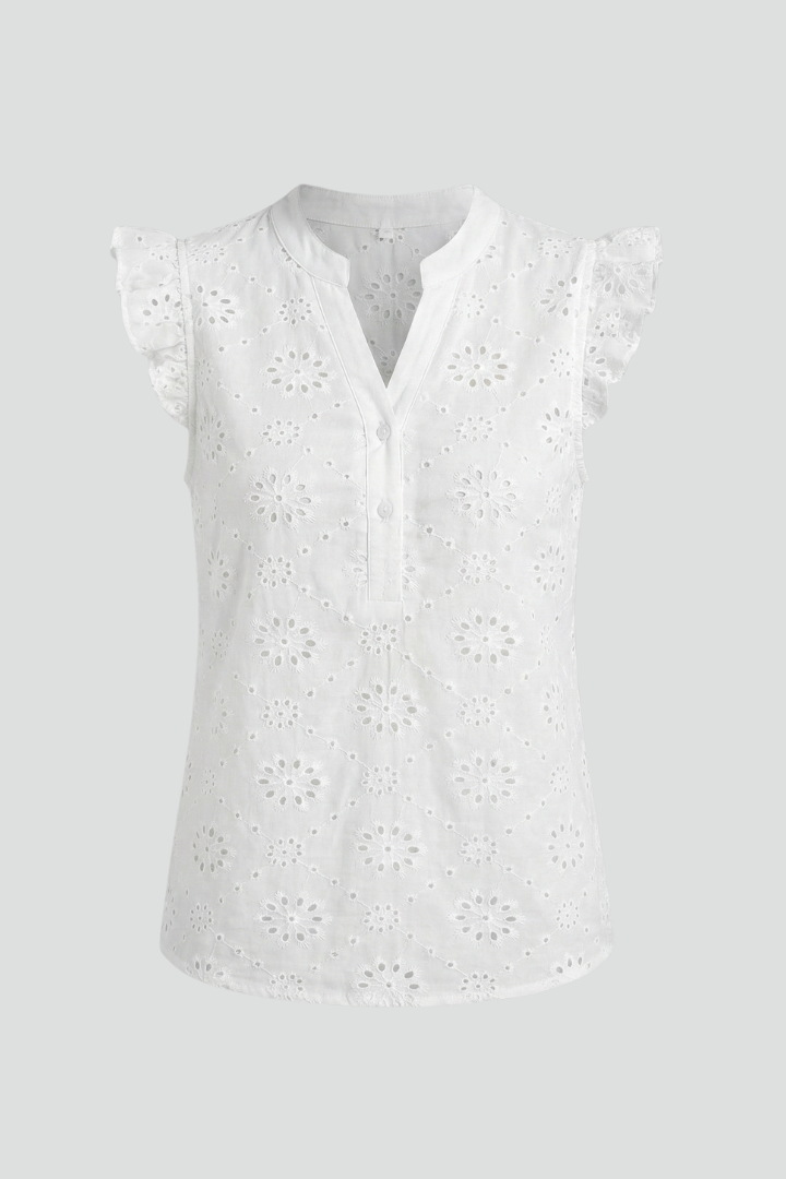 Women’s sleeveless blouse with V-neckline, ruffle shoulders, textured cut-out pattern, and straight hem for summer styling.