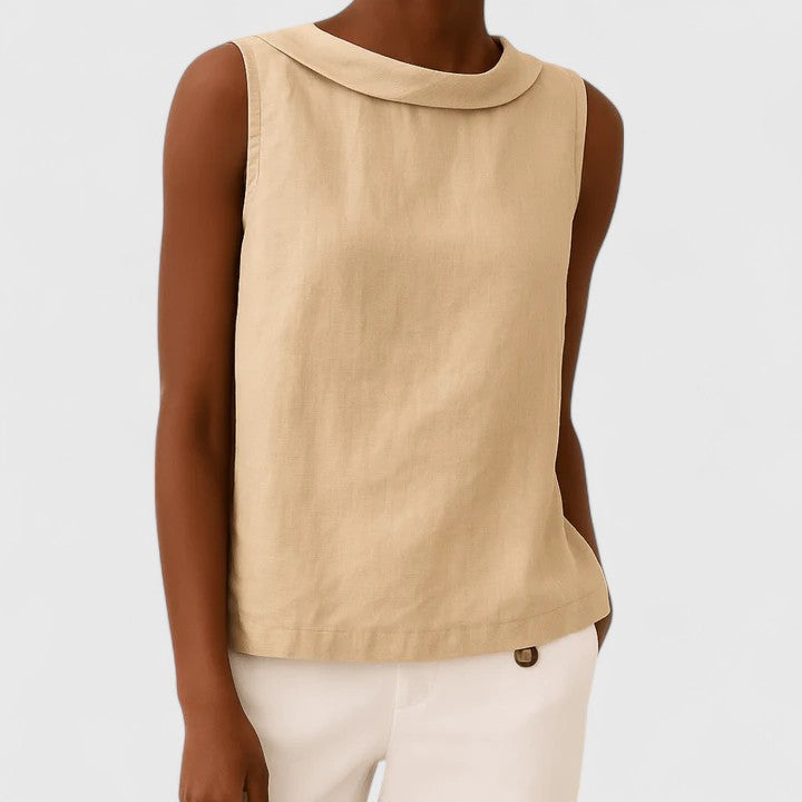 Women’s sleeveless top with a roll collar, draped neckline, and relaxed fit, ideal for office wear, evening outings, and smart-casual styling.