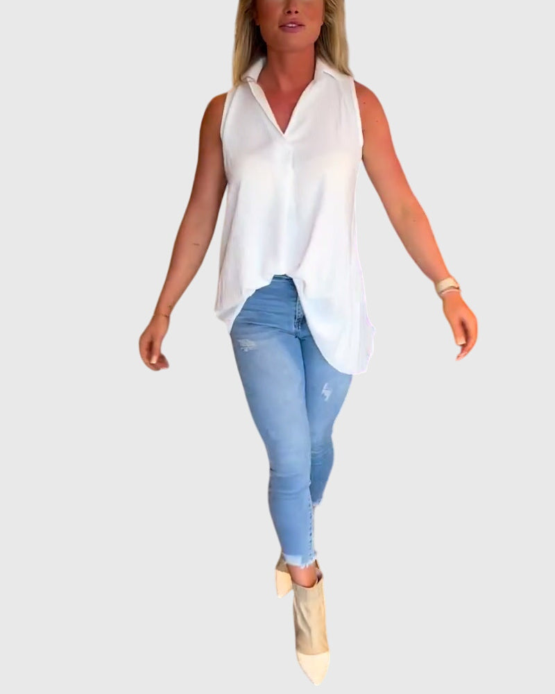 Women’s sleeveless top with ruffle details and a lapel collar, ideal for everyday wear, office outfits, and smart-casual occasions.