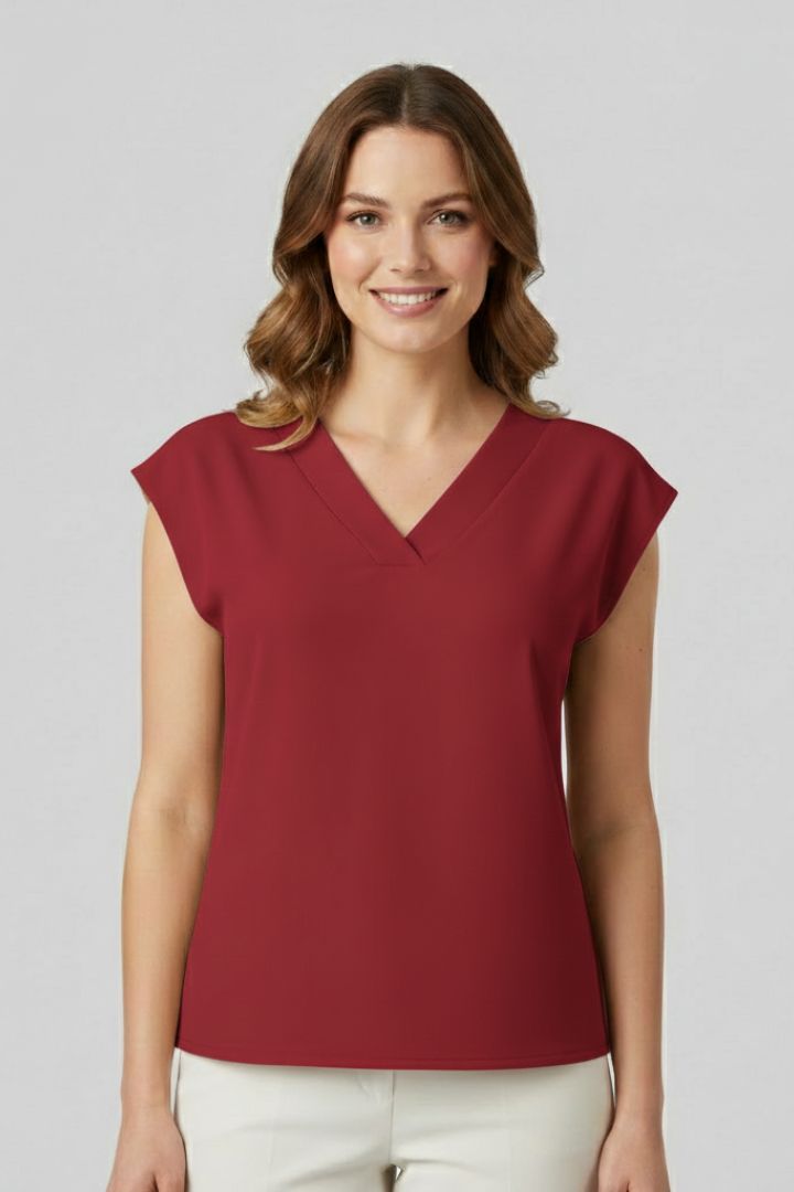 Women’s sleeveless top with V-neckline and straight fit, suitable for everyday wear, office outfits, and layered styling.