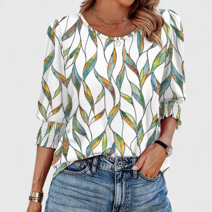 Women’s smocked top with a relaxed fit and lightweight design, ideal for casual outings, vacations, and everyday styling.
