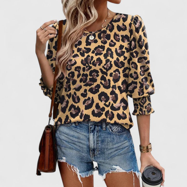 Women’s smocked top with a relaxed fit and lightweight design, ideal for casual outings, vacations, and everyday styling.