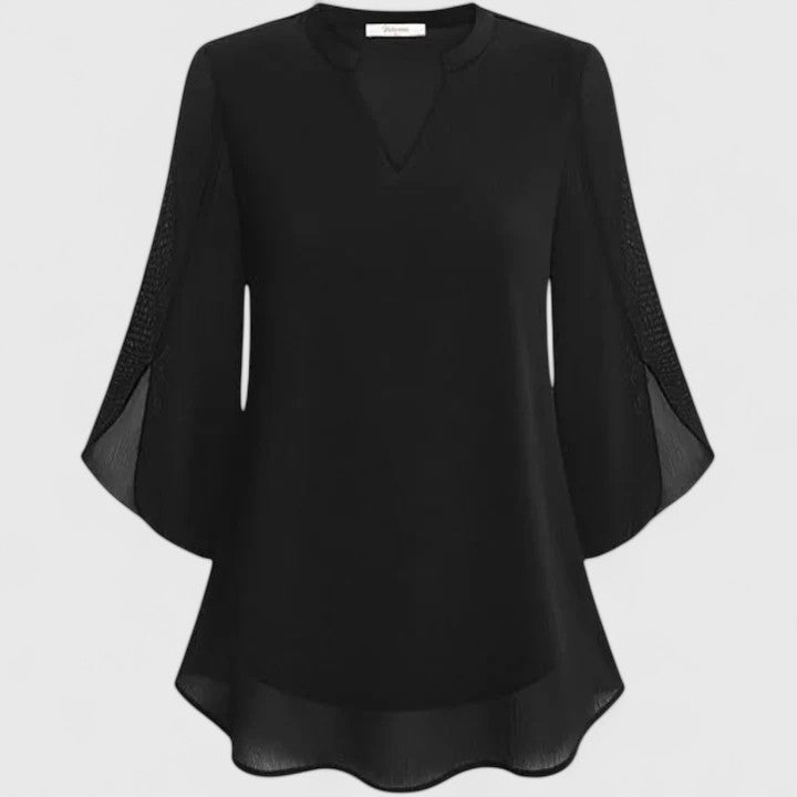 Women’s sophisticated blouse with relaxed fit and elegant silhouette, ideal for office wear, dinners, and casual everyday styling.