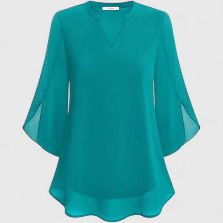 Women’s sophisticated blouse with relaxed fit and elegant silhouette, ideal for office wear, dinners, and casual everyday styling.