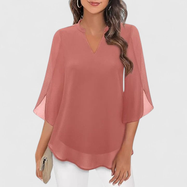 Women’s sophisticated blouse with relaxed fit and elegant silhouette, ideal for office wear, dinners, and casual everyday styling.