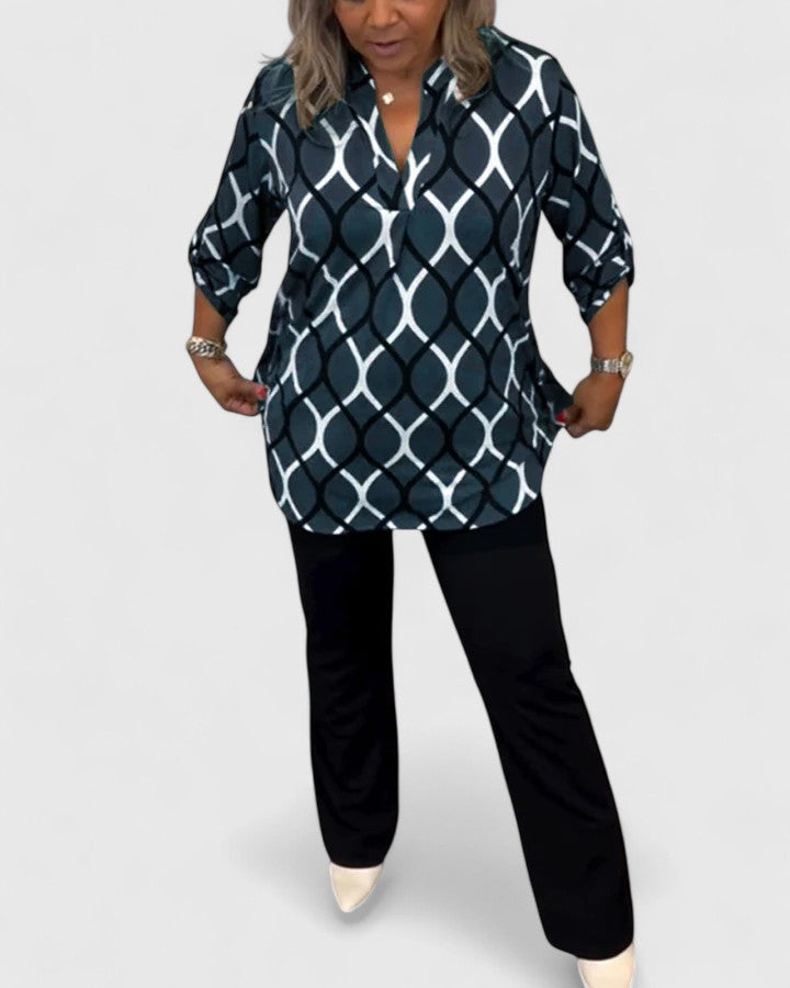 Women’s sophisticated blouse with elegant detailing and a relaxed fit, suitable for office outfits, casual wear, and smart occasions.