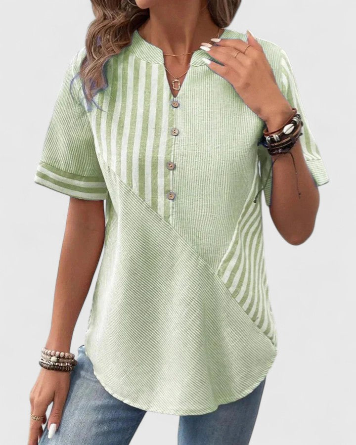 Women’s striped blouse with relaxed fit and classic design, ideal for office wear, casual outings, and everyday styling.