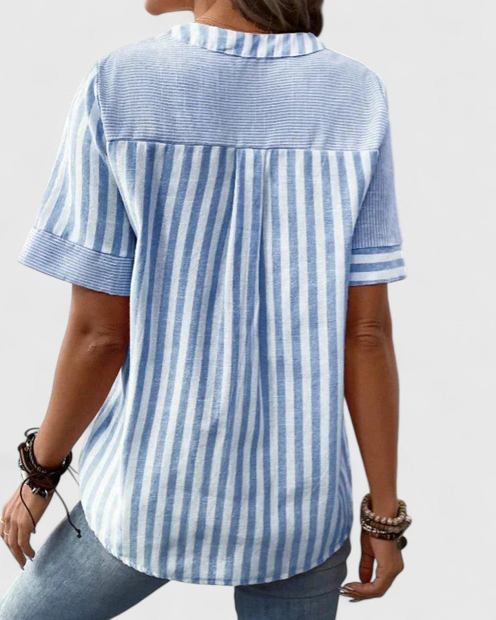 Women’s striped blouse with relaxed fit and classic design, ideal for office wear, casual outings, and everyday styling.