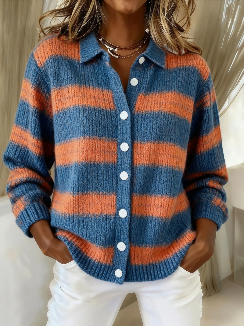 Women’s striped blouse with button-front closure, collared neckline, and wide horizontal stripe pattern, suitable for casual and office styling.