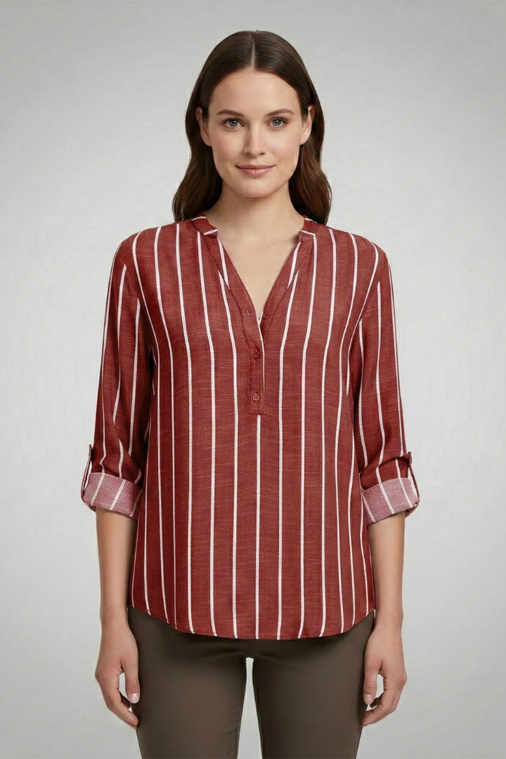 Women’s striped blouse with V-neckline and full button front, featuring roll-up sleeves and a curved hem for office or casual wear.