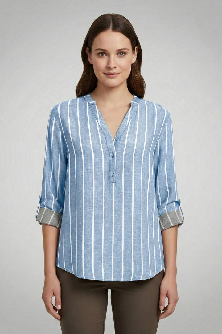 Women’s striped blouse with V-neckline and full button front, featuring roll-up sleeves and a curved hem for office or casual wear.