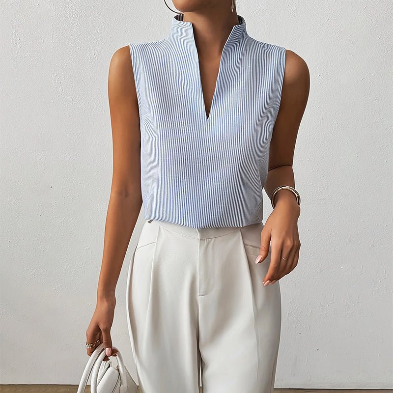 Women’s striped blouse with V-neckline, stand collar, and sleeveless design, suitable for office wear, business casual outfits, and everyday styling.