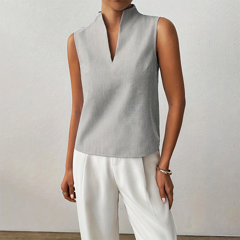 Women’s striped blouse with V-neckline, stand collar, and sleeveless design, suitable for office wear, business casual outfits, and everyday styling.