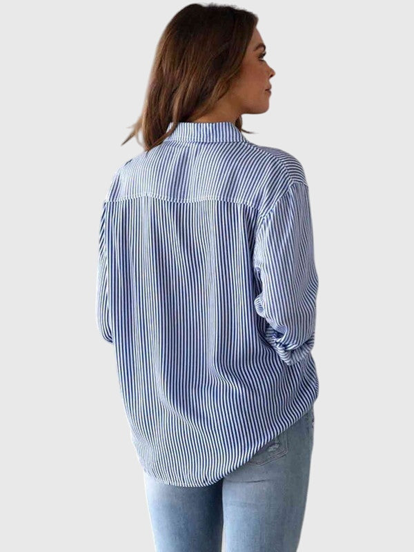 Women’s striped shirt with a collared neckline, button closure, and tailored fit, ideal for office wear, casual outings, and smart-casual occasions.