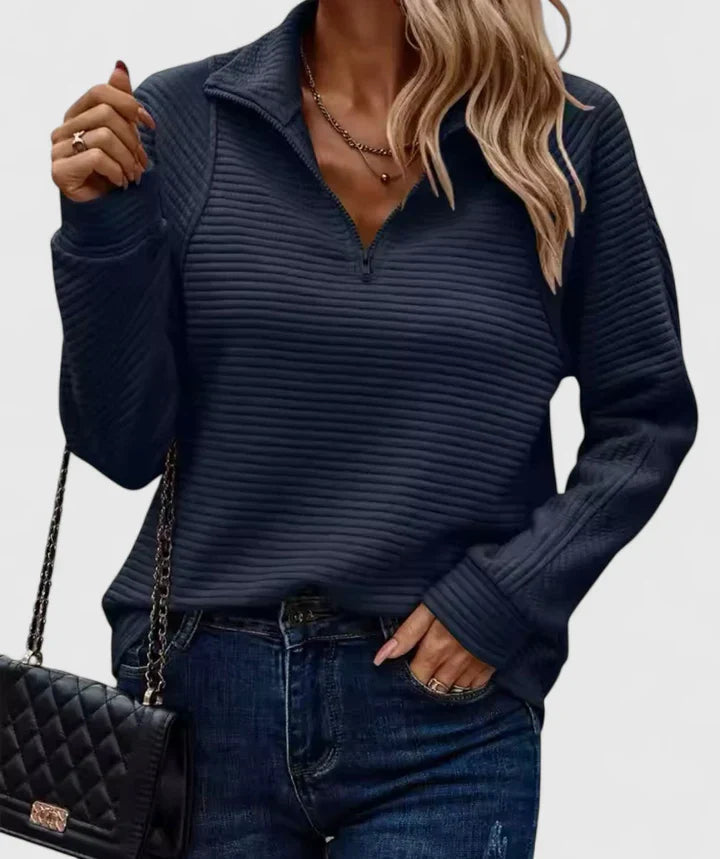 Women’s sweater with a relaxed fit and timeless design, ideal for casual wear, office outfits, and smart-casual occasions.