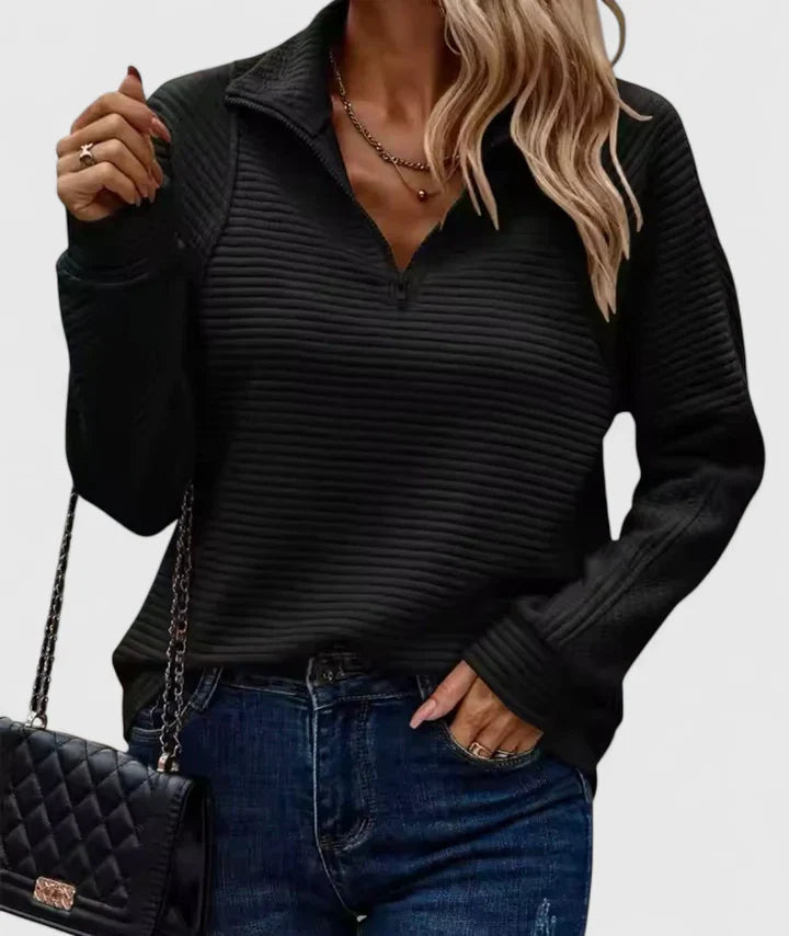 Women’s sweater with a relaxed fit and timeless design, ideal for casual wear, office outfits, and smart-casual occasions.