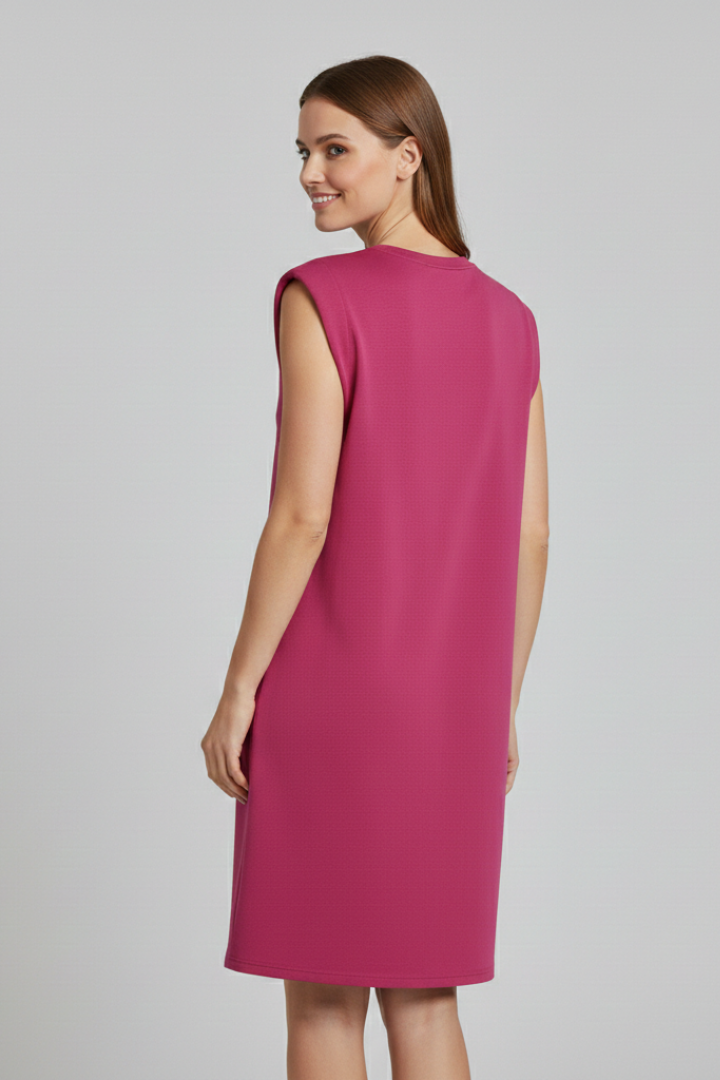 Women’s sleeveless T-shirt dress with shoulder pads, round neckline, and straight hem, suitable for casual wear and modern everyday styling.