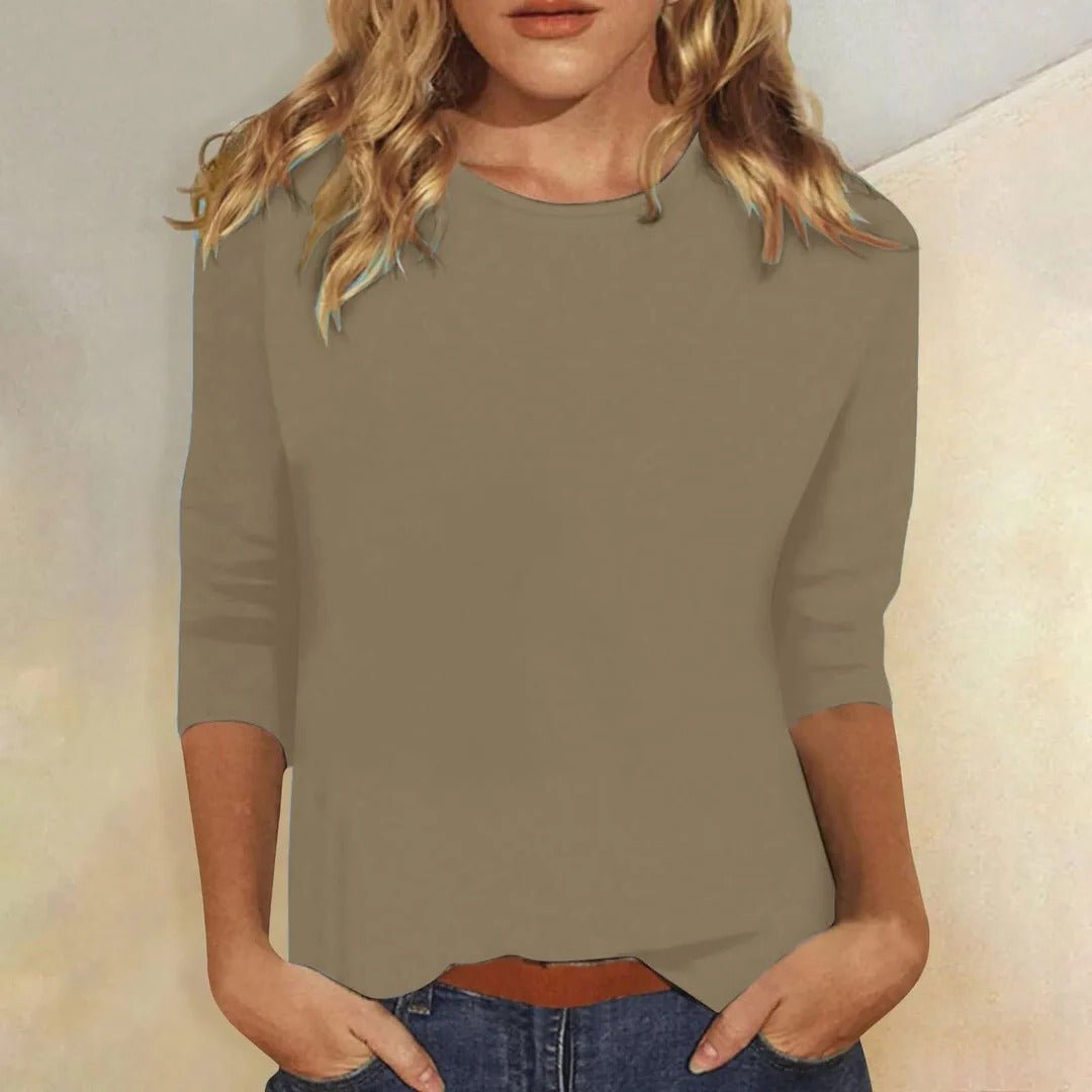 Women’s top with 3/4 sleeves, crew neckline, and regular fit, ideal for everyday wear, office outfits, and casual styling.