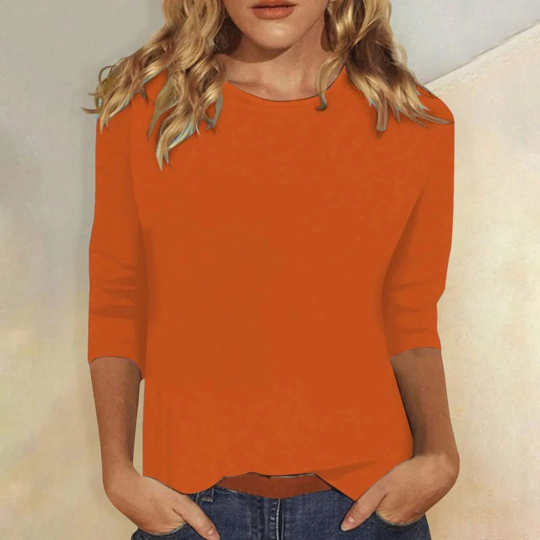 Women’s top with 3/4 sleeves, crew neckline, and regular fit, ideal for everyday wear, office outfits, and casual styling.