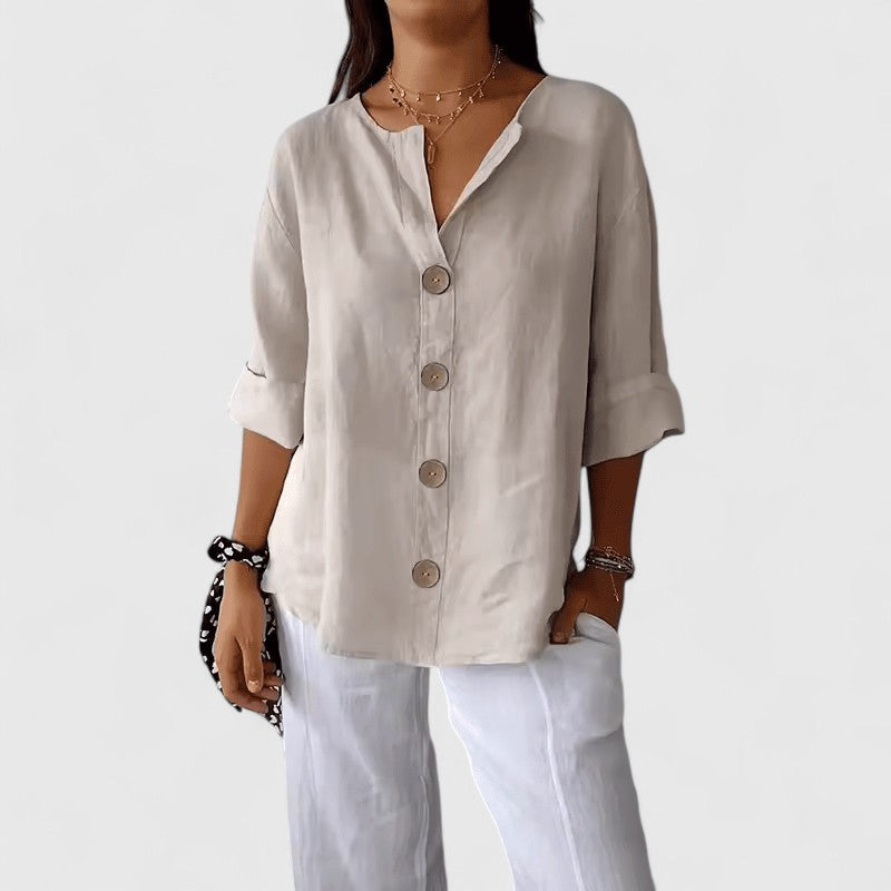 Women’s V-neck blouse with button-front detail and relaxed fit, ideal for office wear, vacations, and casual everyday styling.