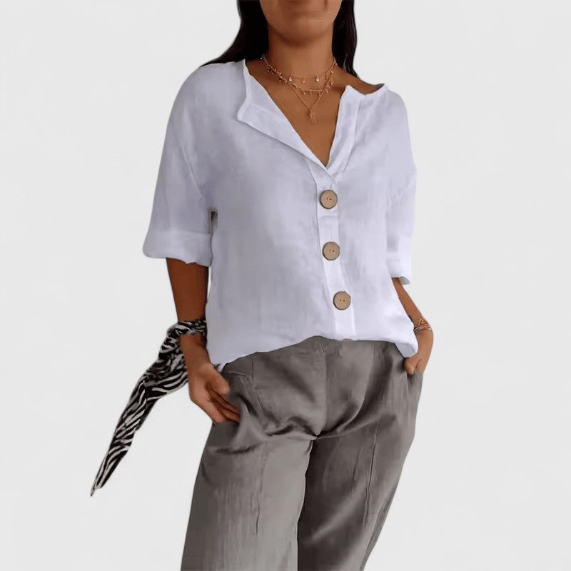 Women’s V-neck blouse with button-front detail and relaxed fit, ideal for office wear, vacations, and casual everyday styling.