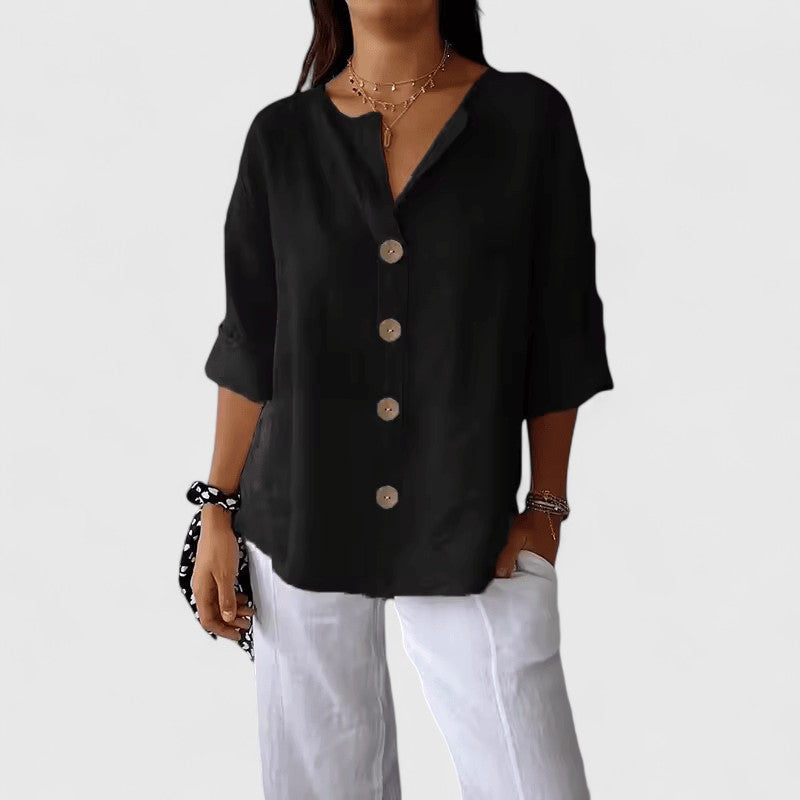 Women’s V-neck blouse with button-front detail and relaxed fit, ideal for office wear, vacations, and casual everyday styling.