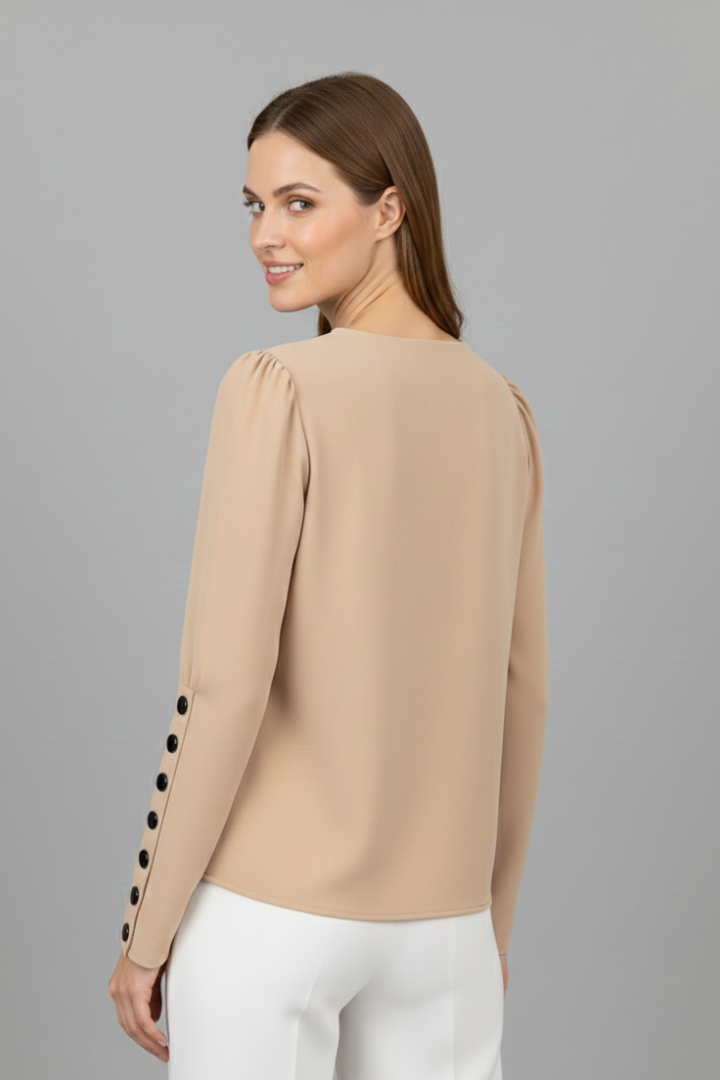 Women’s V-neck blouse with contrast trim, wrap-style front, and cuff buttons, featuring a color block design for office or everyday wear.