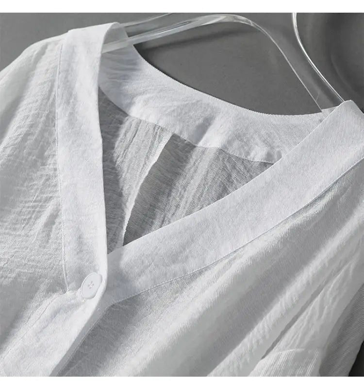 Women’s v-neck blouse with batwing sleeves and a loose fit, suitable for summer outfits, casual wear, and relaxed everyday styling.