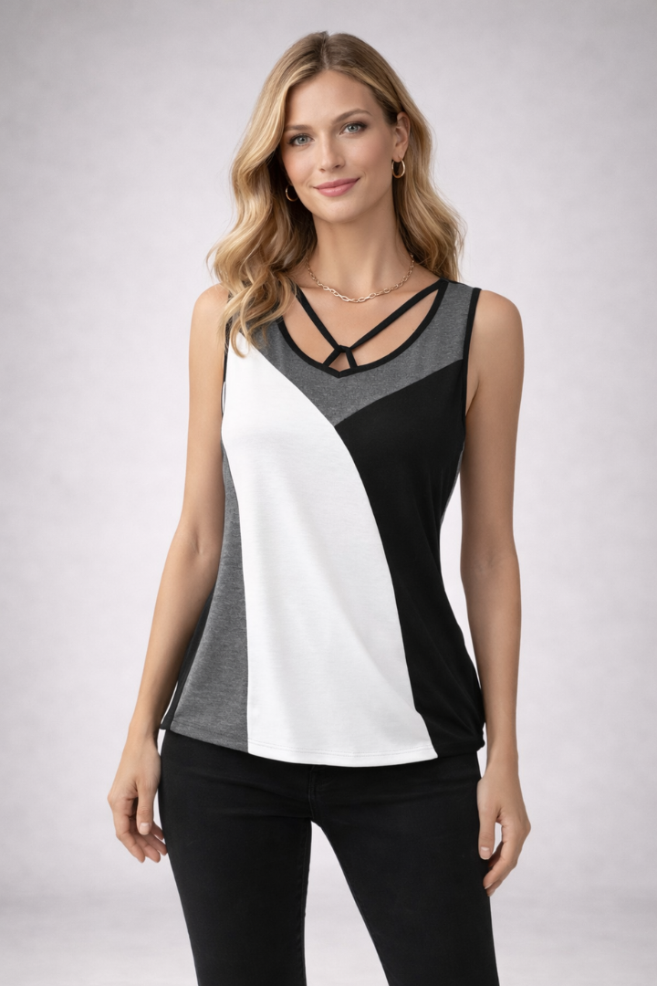 Women’s sleeveless top with v-neckline and strap detail, featuring colour block panels for casual and summer outfits