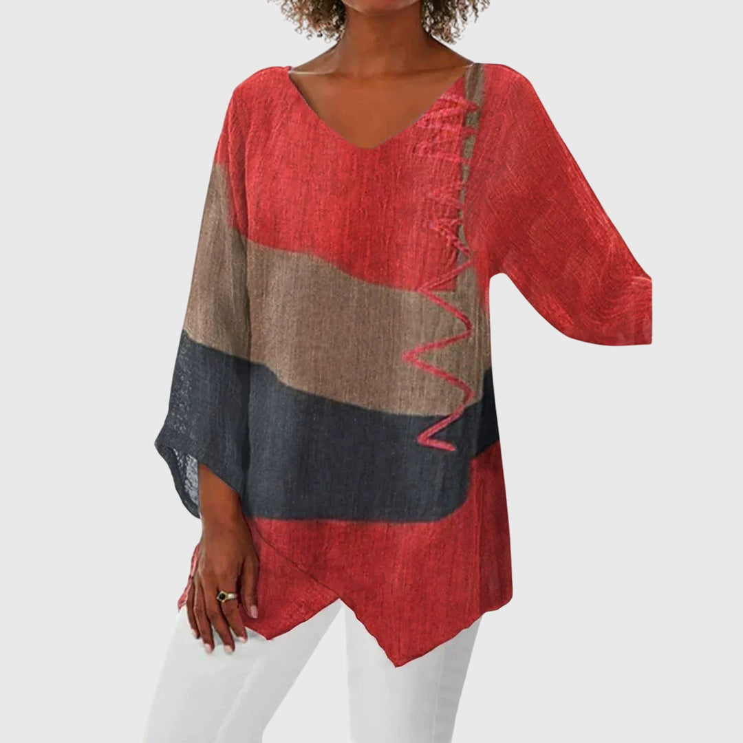 Women’s V-neck top with an artistic print and flowy fit, ideal for office wear, casual outings, and everyday styling.