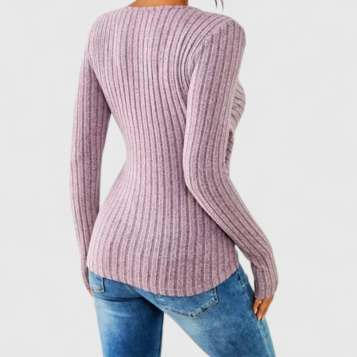 Women’s V-neck top with a tummy-tucking fit and relaxed style, ideal for casual outings, office wear, and smart-casual occasions.