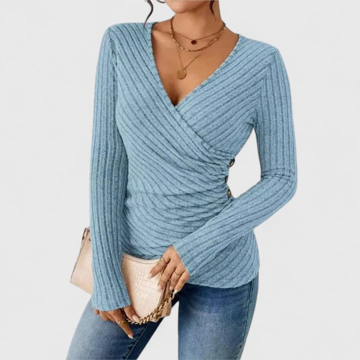 Women’s V-neck top with a tummy-tucking fit and relaxed style, ideal for casual outings, office wear, and smart-casual occasions.