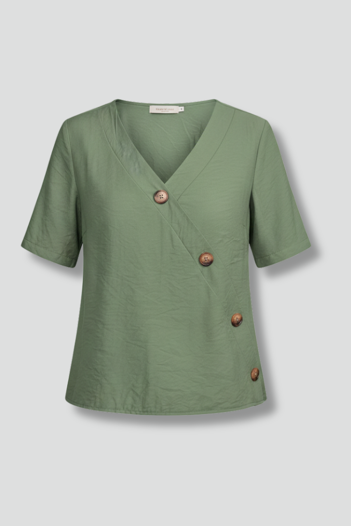 Women’s wrap style blouse with V-neckline and button accents, featuring short sleeves and a straight hem for office or everyday wear.