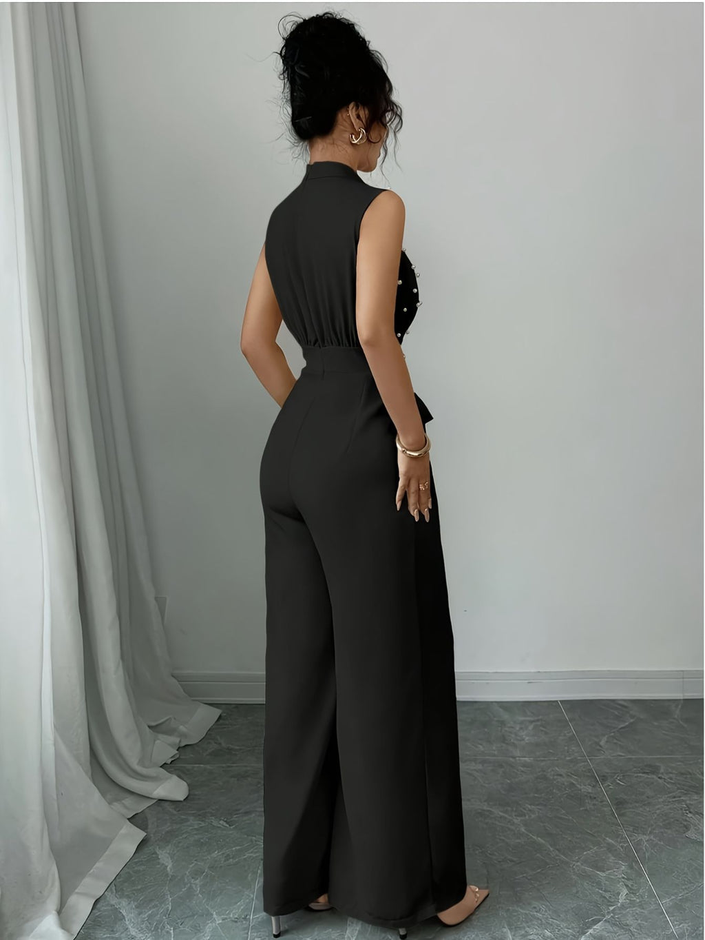Sleeveless High-Neck Jumpsuit
