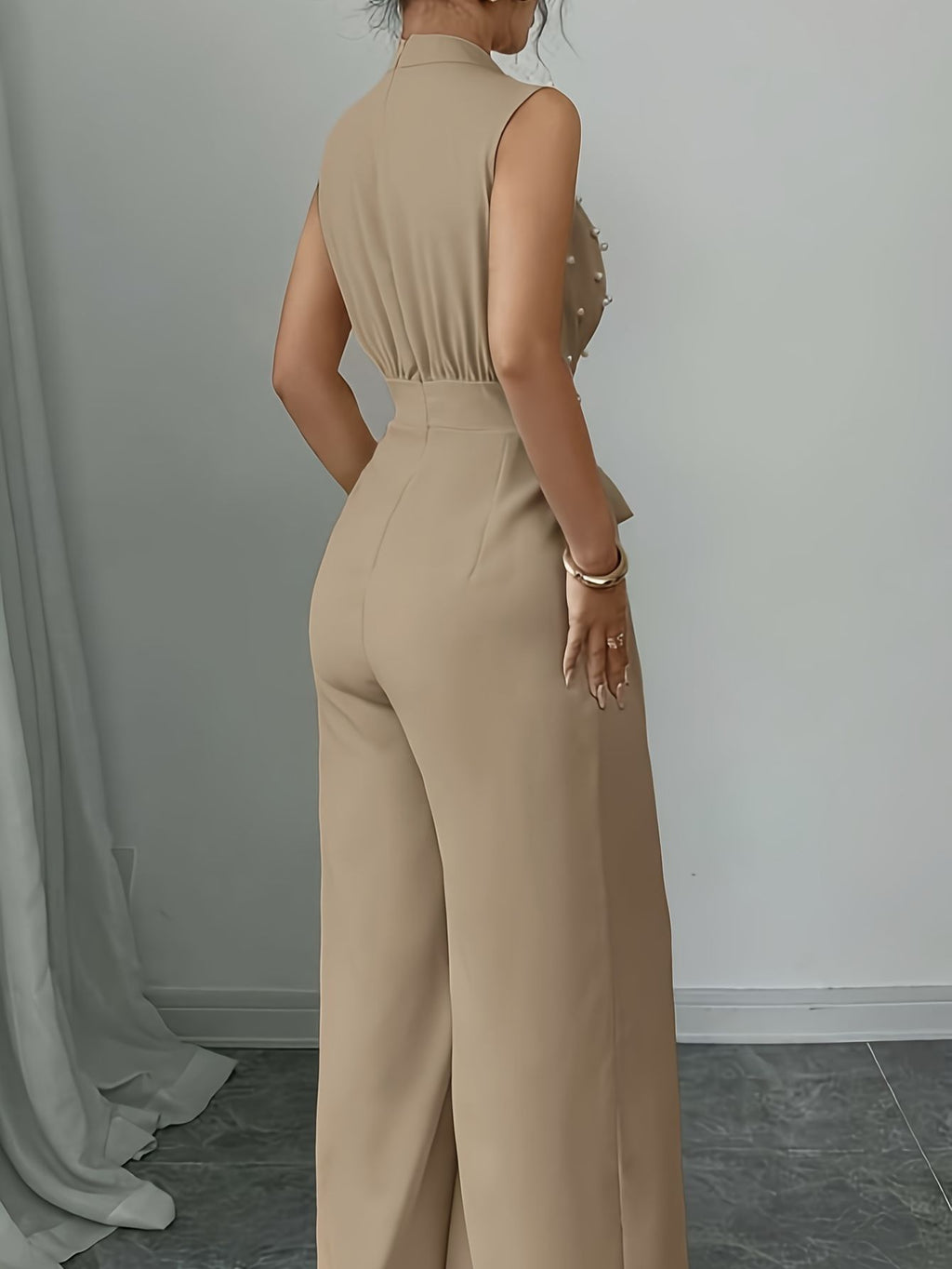 Sleeveless High-Neck Jumpsuit