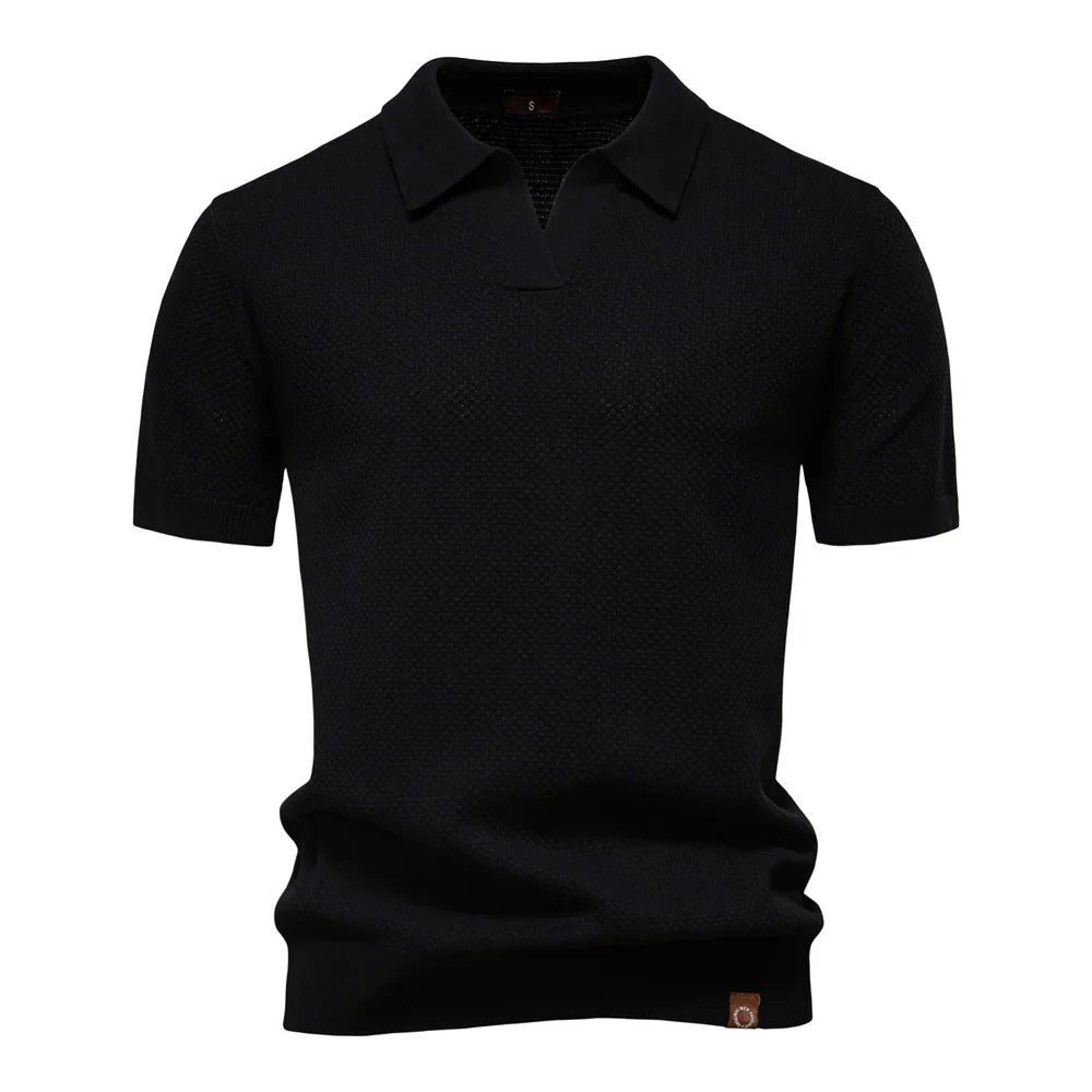 Men’s polo shirt with a structured collar, short sleeves, and tailored fit, ideal for summer days, casual outings, and smart-casual wear.