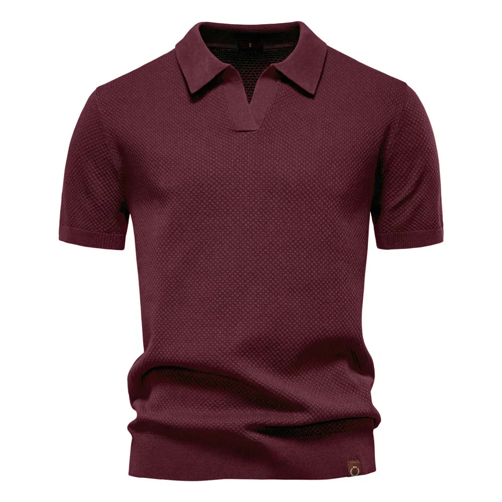 Men’s polo shirt with a structured collar, short sleeves, and tailored fit, ideal for summer days, casual outings, and smart-casual wear.