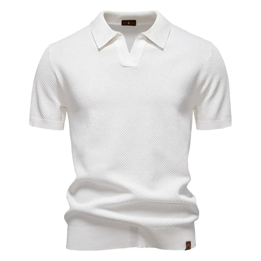 Men’s polo shirt with a structured collar, short sleeves, and tailored fit, ideal for summer days, casual outings, and smart-casual wear.